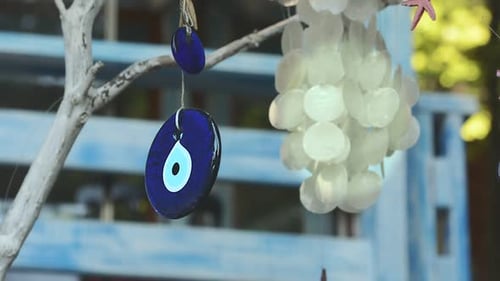 Wind Chimes and Seashells Hanging Outdoors