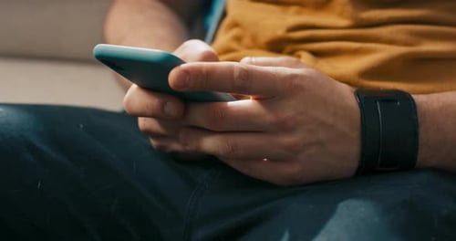 Man Using Smartphone for Communication and Technology