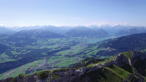Cinematic Aerial View of Mountain Peak Landscape Scenery