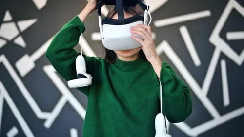 Woman Puts On a Virtual Reality Headset