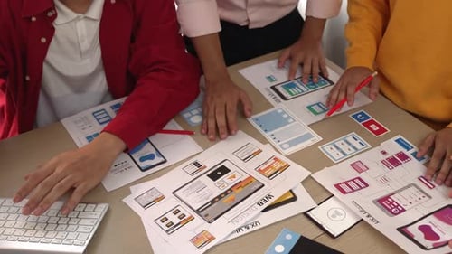 Team Designing Website User Interface at Table