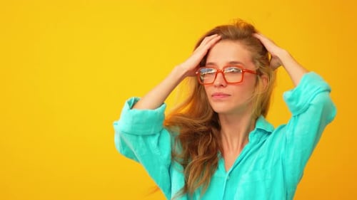 Woman Smiling With Wind Blowing Hair