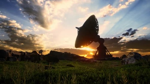 Futuristic Satellite Dish Silhouette Turning at Sunset