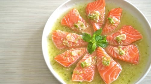 Appetizing Salmon Dish with Green Sauce and Mint
