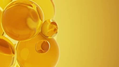 Close Up of Golden Oil Bubbles Abstract Liquid Motion
