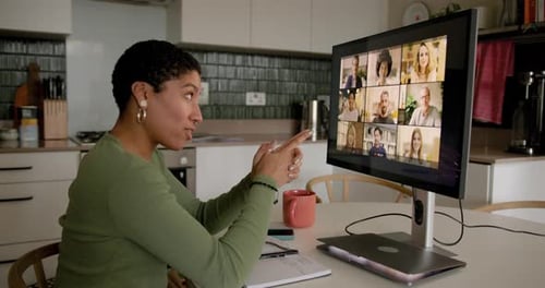 Woman Attends Virtual Meeting From Home