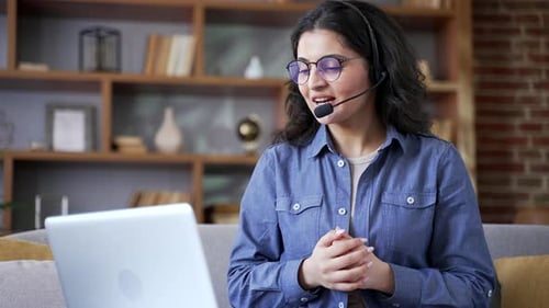 Woman Works Remotely On Video Conference Call