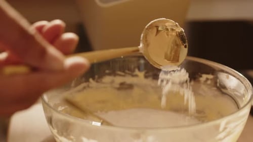 Close Up of Mixing Dough in Bowl