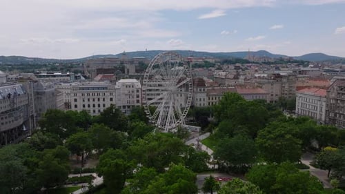 Aerial Slide and Pan Footage of Tourist Attraction on Elizabeth Square Big White Ferris Wheel
