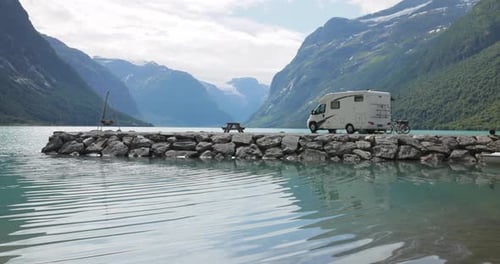 Family vacation travel RV, holiday trip in motorhome. Beautiful Nature Norway natural landscape.