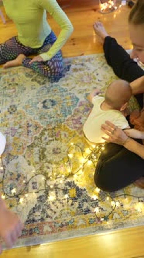 Family and Baby Practicing Yoga at Home