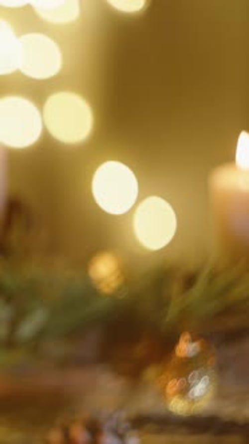 Vertical video. Beautiful New Year's bokeh created by the warm light of garlands