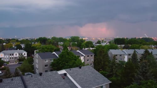 Suburban Townhouses Under a Cloudy Sky Aerial View