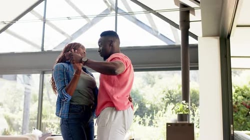 Couple Dancing Together in Modern Home Interior