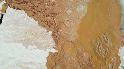 Mesmerising aerial view of dry desert-like dunes. Exquisite terrain reminds of dried beach once hidd