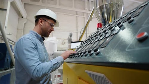 Manufacturing Worker Programming Industrial CNC Machine Tool at Pvc Factory