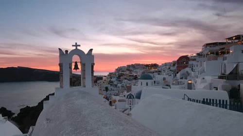 Oia Santorini Sunset and Bells Time Lapse, Cyclades Island in Aegean Sea, Greece