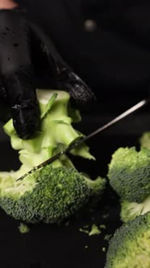 The chef prepares a vegetable dish. Cooking broccoli