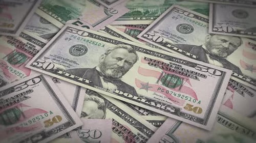 Pile of american dollars cash money, inflation concept. Closeup new american fifty dollar bills 4k