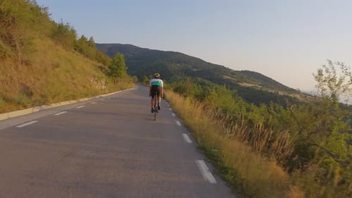 Road Cyclist Man Training at Full Speed