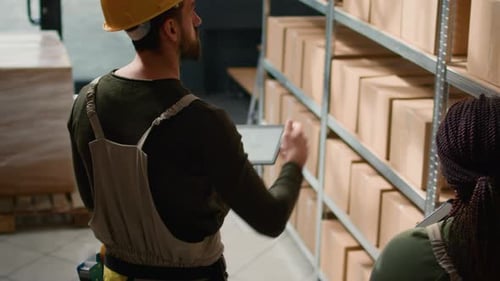 Staff Members Preparing Warehouse Orders