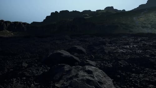 A Rocky Mountain with a Few Rocks in the Foreground