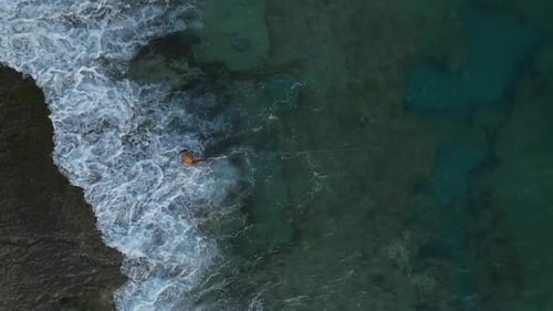 Aerial View Dramatic Clouds Enhance the Beauty of a Mediterranean Sunset with Glowing Waters