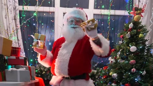 Santa Claus Holding Gifts in Decorated Christmas Setting
