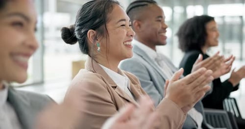 Smile, support and applause with business people in a seminar or workshop for training