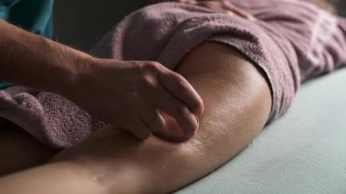 Massage Therapist Doing Back Vacuum Massage With Cups In Spa