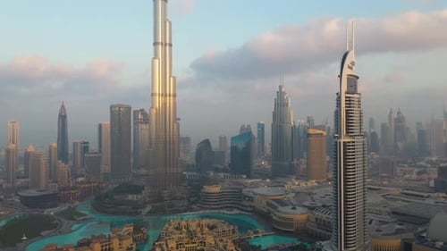 Aerial view of Burj Khalifa downtown Dubai at sunset.