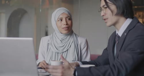 Business People Meeting at Cafe Table