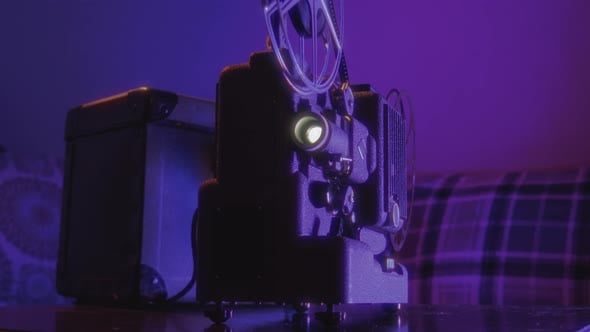 Vintage Projector Glowing in Dim Light Creating an Atmospheric ...