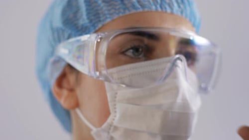 Medical Professional in Mask and Protective Eyewear
