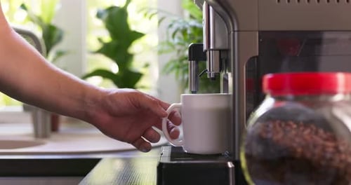 Espresso Shot Brews into Mug at Home
