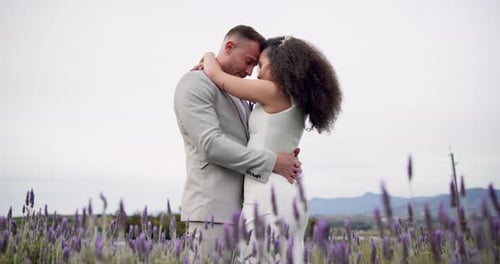 Newlyweds Embracing in Romantic Lavender Field