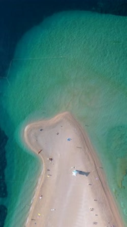 A Breathtaking Aerial View Showcasing the Stunning Zlatni Rat Beach Located on Brac Island in