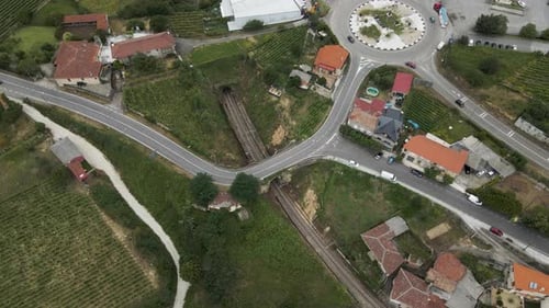 Aerial view of vehicles driving on the road in Val de Pereira, Ourense, Spain.