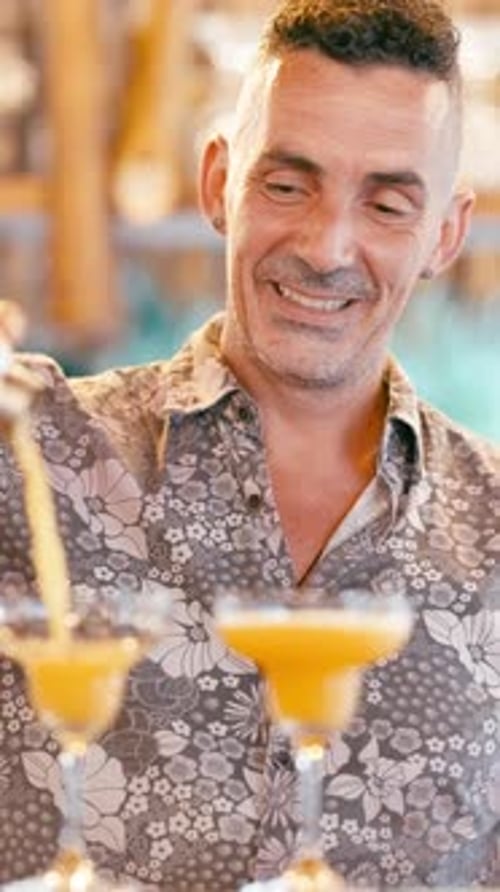Bartender Making Cocktails at Tropical Bar