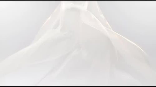 Flowing White Silk Fabric Drapes Elegantly Reveal Background