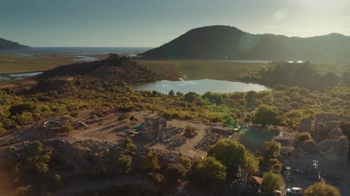 Dalyan,Mugla.Turkey.
Aerial view of Kaunos ancient city in sunny day. delta and the mountains around