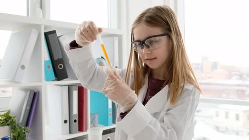 School Girl in Chemistry Class