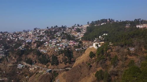 Aerial Drone Shot Of a city situated in top of the mountains. Almora city of uttrakhand.