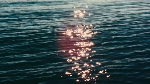 Golden Sun Glitter Reflections on Ocean Waves