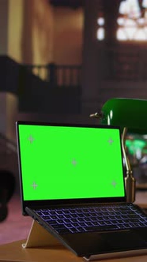 Vertical Video Professional Librarian Working on Her Laptop Next to Mockup Screen in a Public