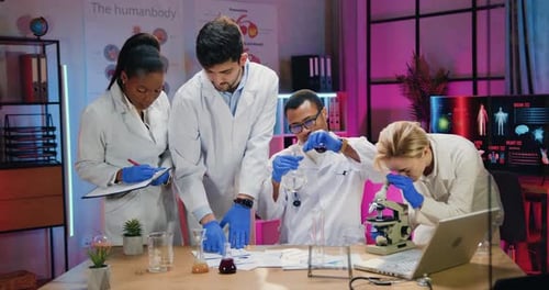 Scientists Conducting Research in a Lab