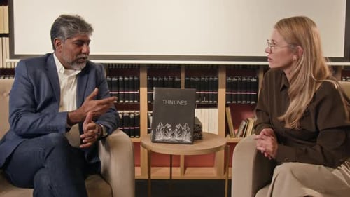 Book Author Giving Interview About his New Work, Presenting It in Book Store