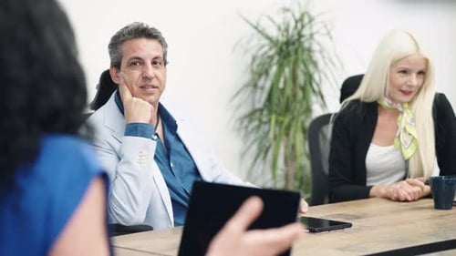 Business Colleagues Talking During a Project Meeting in the Office