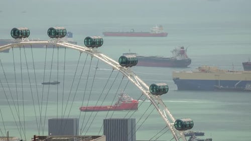 Container Ships and Ferris Wheel in Singapore