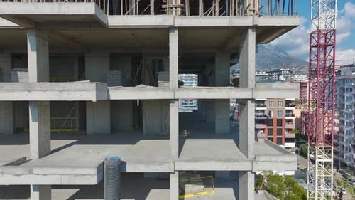 Aerial View of Unfinished Concrete Building Construction Site
